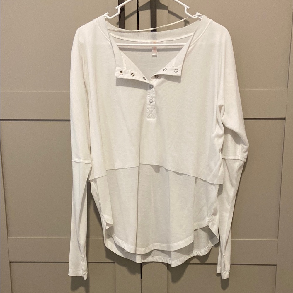Free People White long sleeve button down shirt with scoop neck and polo collar